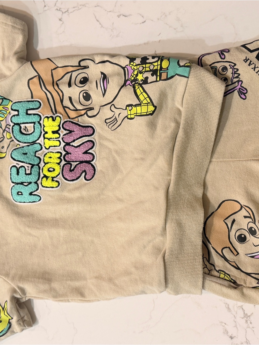 Disney Beige 'Reach for the Sky' Woody Graphic Sweatshirt
